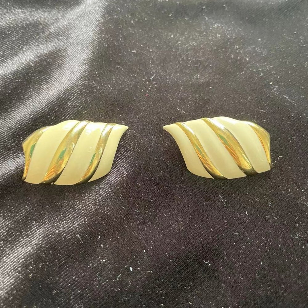 vintage monet gold tone white enamel earrings clip on